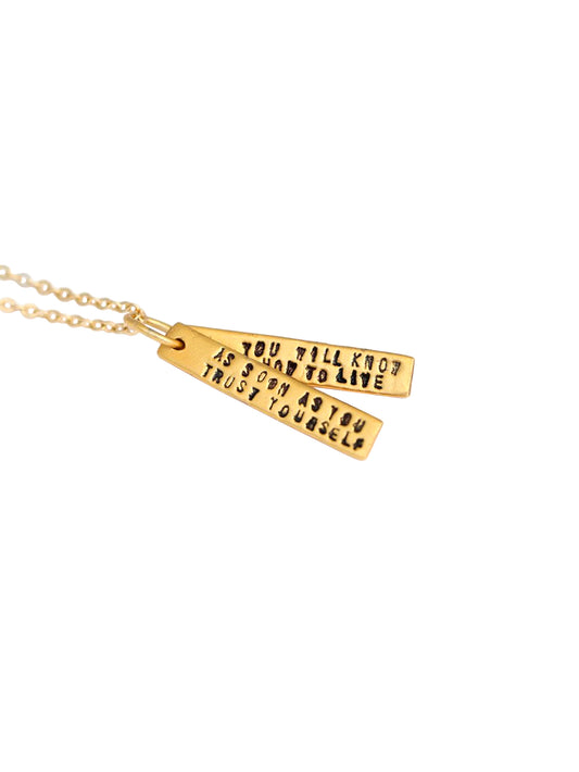Chocolate & Steel Long-Bar Quote Necklace Goethe Gold Weston Table