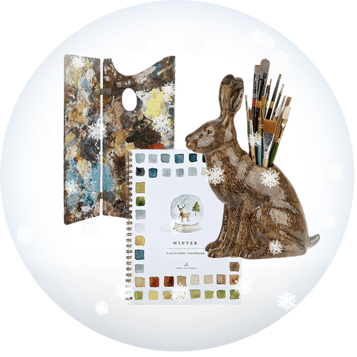 Vintage artists brushes and palette, and a watercolor notebook on a transparent background with snow.