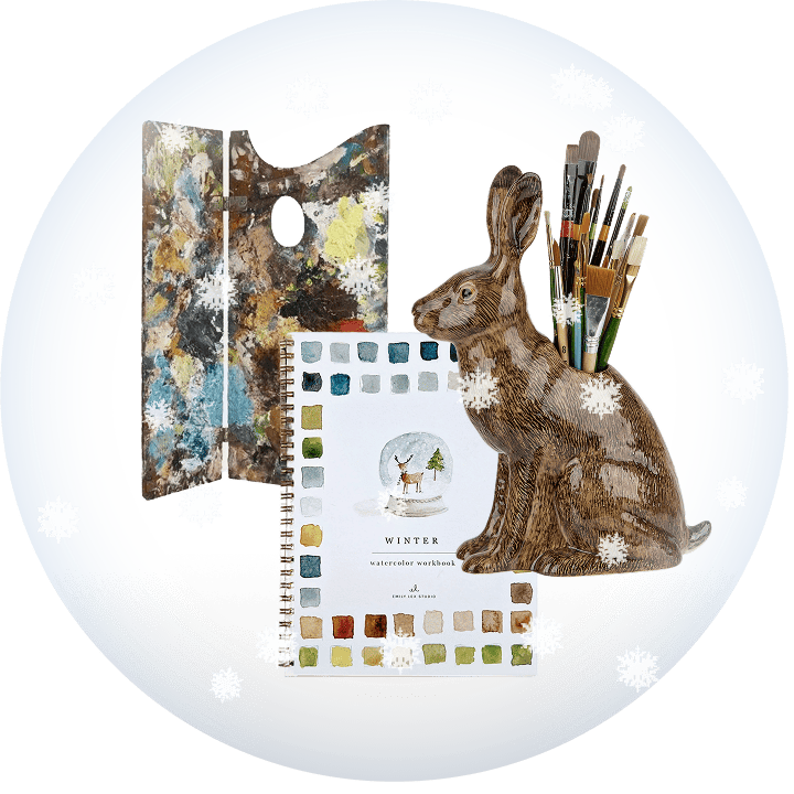 Vintage artists brushes and palette, and a watercolor notebook on a transparent background with snow.