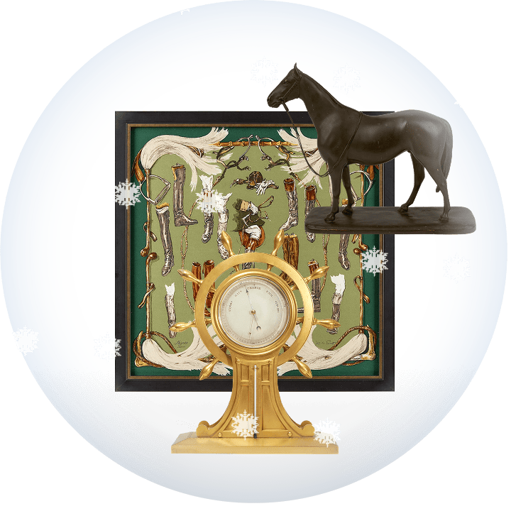 Vintage brass barometer with a an equestrian-themed vintage Hermes scarf and an antique Japanese horse sculpture on a transparent background with snow.