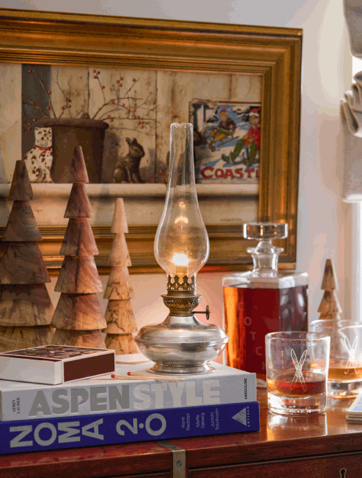 Animated gif of a lamp, candle, pillows, and wall art in a ski-themed bedroom.