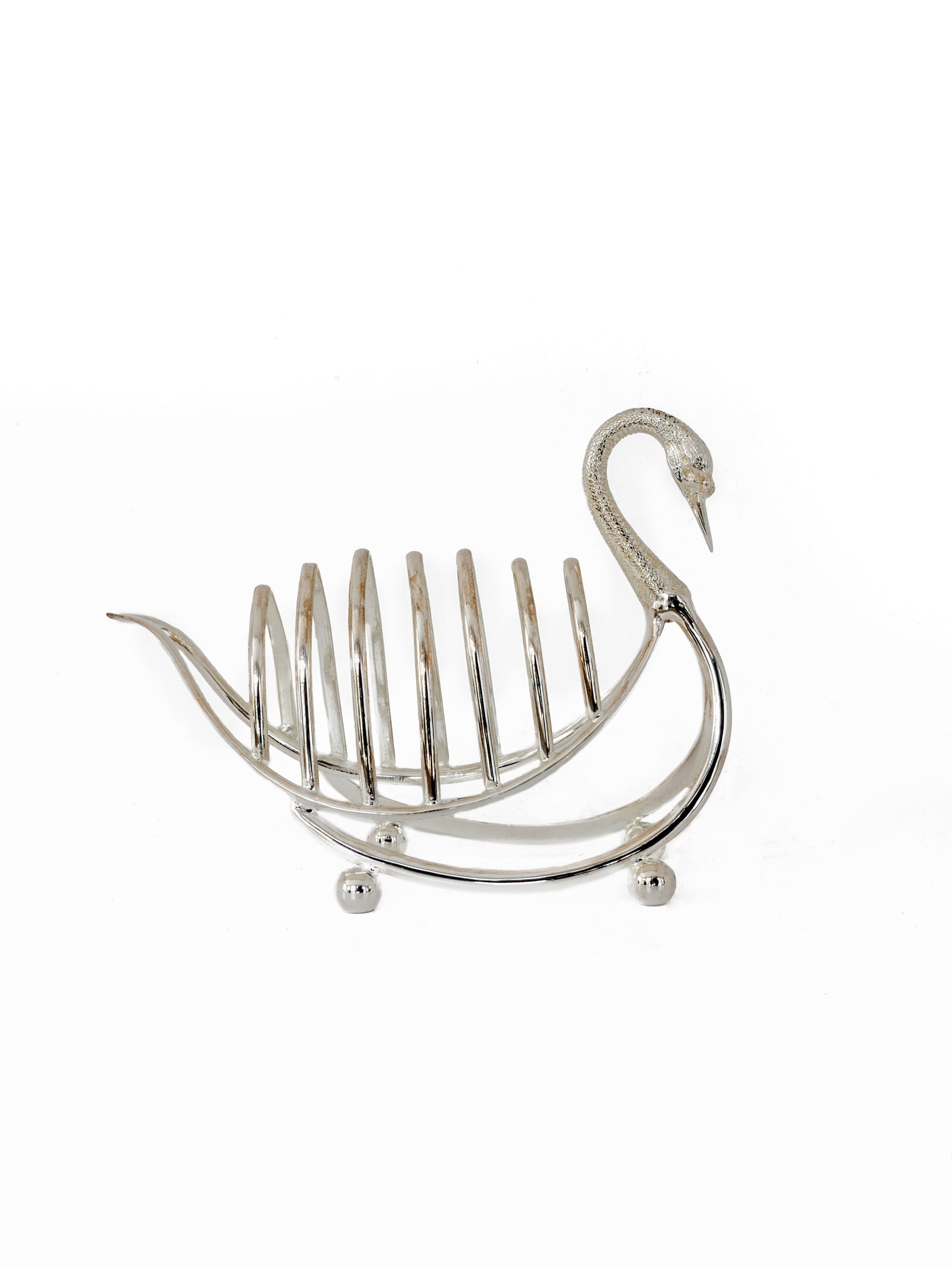 https://westontable.com/cdn/shop/products/19th-Century-Henry-Wilkinson-Silver-Plated-Swan-Toast-Rack-Weston-Table-.SPjpg_2aba7ea6-d2ae-4f89-82f4-74c30be45405.jpg?v=1612445336&width=1946
