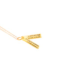 Chocolate & Steel Long-Bar Quote Necklace Leonard Cohen Gold Weston Table