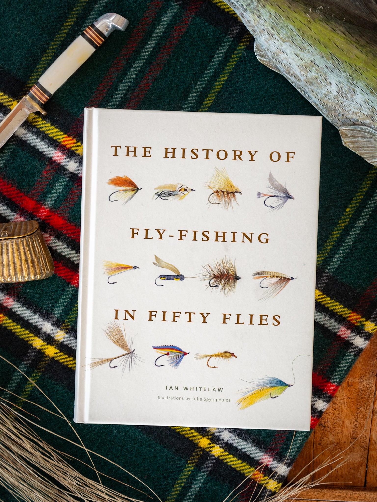 The History of Fly-Fishing in Fifty Flies by Ian Whitelaw Weston Table